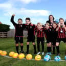 East Ayton Football Champions with Head Lisa Nellist and Teacher Josh Lowe pic Richard Ponter