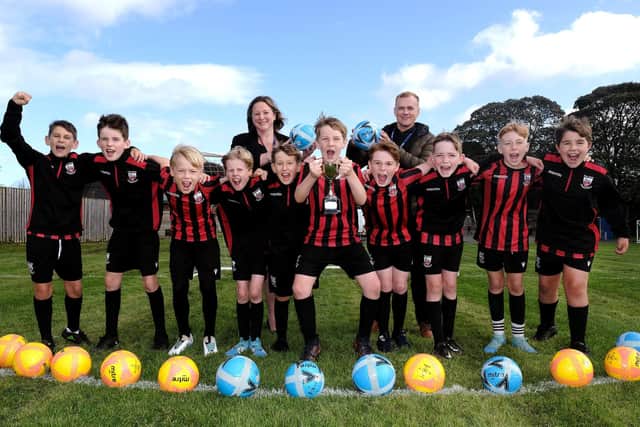 East Ayton Football Champions with Head Lisa Nellist and Teacher Josh Lowe pic Richard Ponter