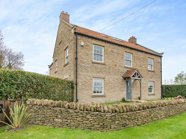 A front view of Low Hall Cottage, that is on the market at £1.5m.