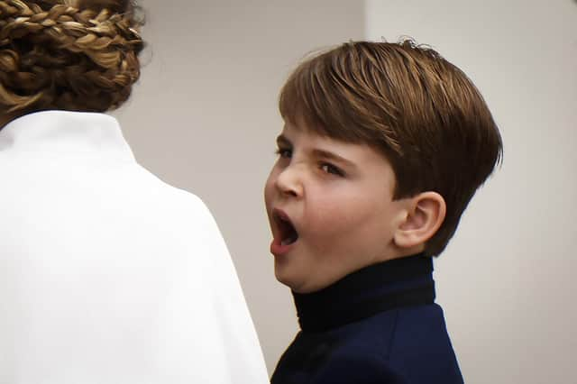 Britain's Prince Louis of Wales yawns as he arrives at Westminster Abbey.