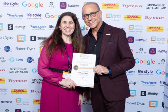 Hetty and Betty's Lois Kirtland receiving the Small Business Sunday Award from Theo Paphitis.