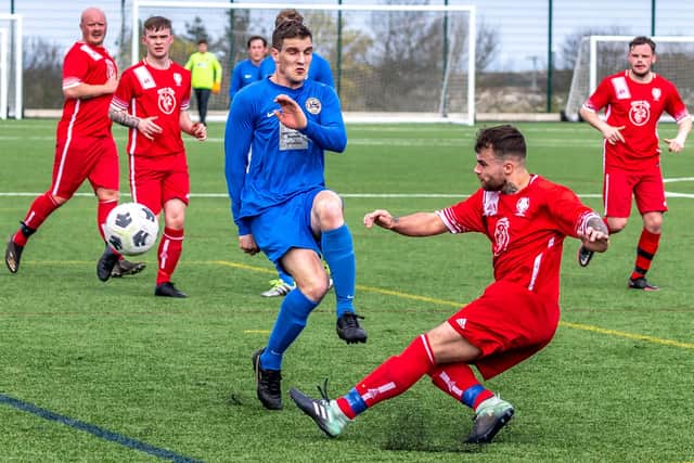 Fishermen's Jake Faichney challenges a Newlands player.