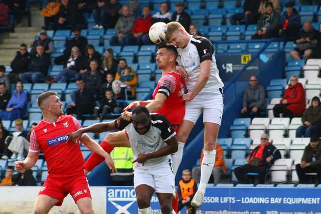 Boro skipper Will Thornton challenges for a header.