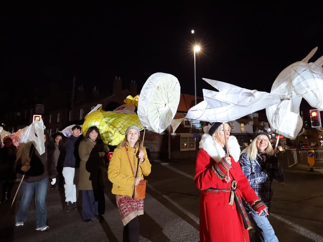 The parade in motion.