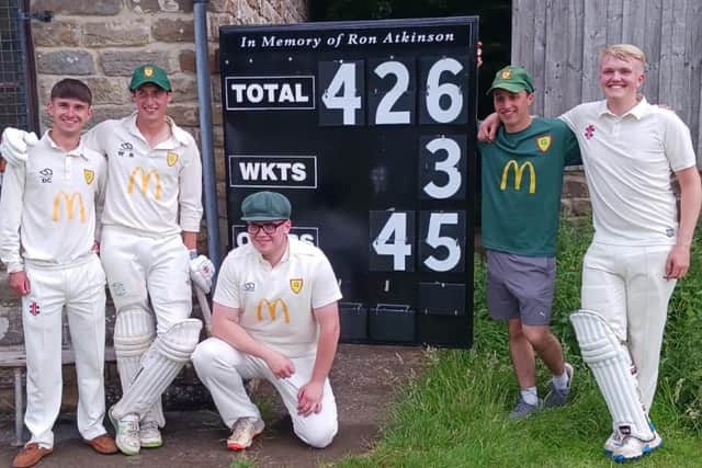 From left, Ganton's Dan Connor, captain Will Bradley, Pat Philpot, Jack Heslehurst and Isaac Hatton line up with the scoreboard after Bradley and Heslehurst's terrific tons.