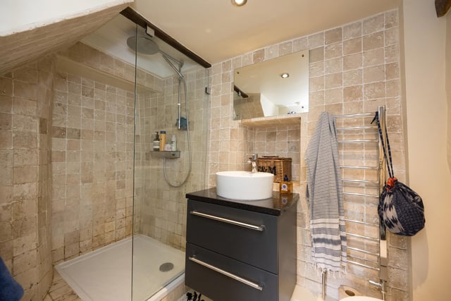 A fully tiled shower room is among the cottage facilities.