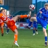 Liversedge's Connor Smythe with Whitby Town's Harry Green