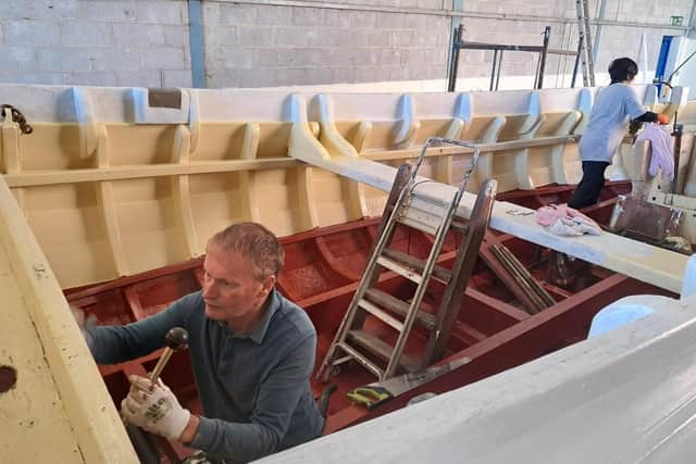 Working on Three Brothers refit. Photo courtesy of Ian Coultas