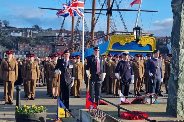 The REME (Corps of Royal Electrical and Mechanical Engineers) at Whitby's war memorial. Photo courtesy of Whitby Town Council.