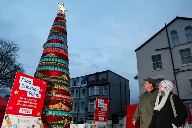 Tesco and its charity partners in Scarborough have created a 20ft tree made entirely from the top ten most needed food items this Christmas. (Picture by Andrew Parsons / Parsons Media)