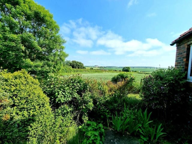 The village property has views that stretch for miles.