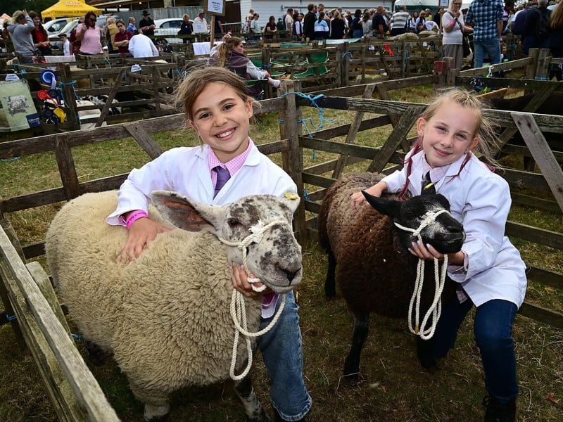 Olivia and Hollie with their prize-winning sheep. photo: Richard Ponter