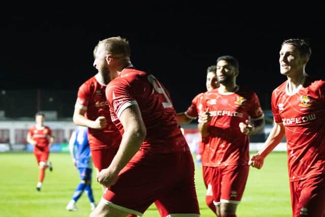 Brid striker Jake Day celebrates putting the home side in front. Photo by Wandering Photography
