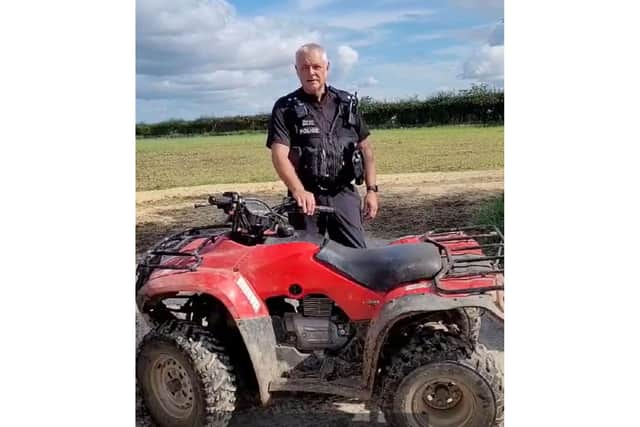 Rural Task Force Sgt Mark Earnshaw with a quad similar to the one stolen