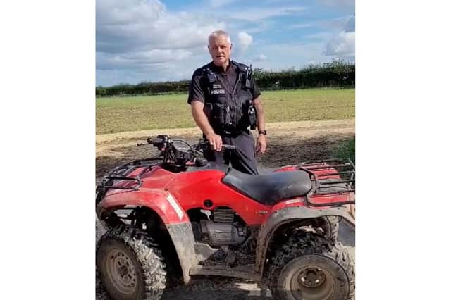 Rural Task Force Sgt Mark Earnshaw with a quad similar to the one stolen