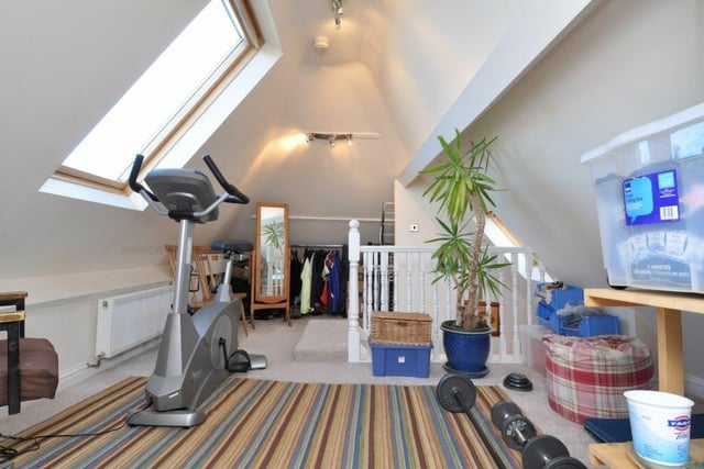 A versatile attic room adds to the house facilities.