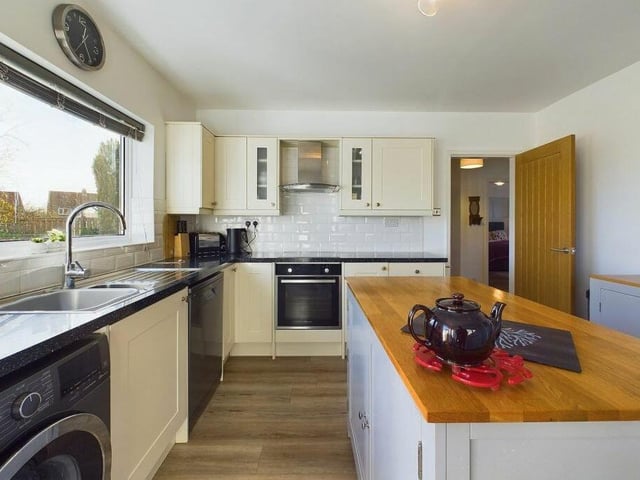 An alternative view of the kitchen, that has integrated appliances.
