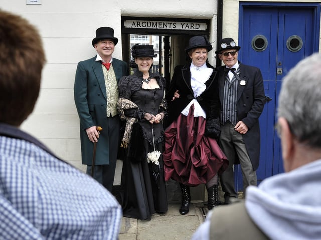 Friends get together for photos, at the Springtime Whitby Goth Weekend, 2014.Photo by Andrew Higgins.