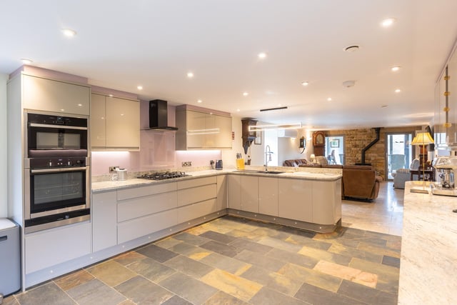 The high spec, open plan kitchen with family space and diner.