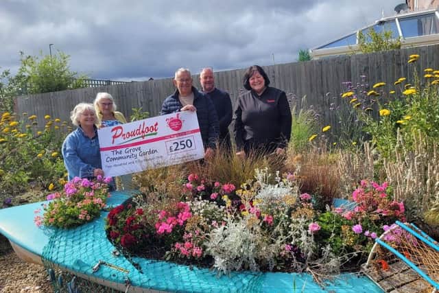 Proudfoot donates £250 to The Grove Community Garden.