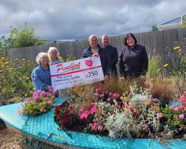 Proudfoot donates £250 to The Grove Community Garden.