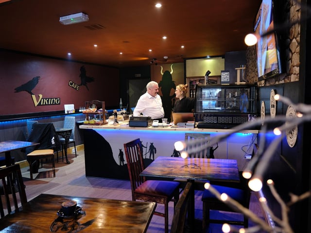 On the tables there are runes painted upon them symbolising the 'Tree of Life' and a compass. The 'Tree of Life' can be spotted through the cafe, and in the Viking era it represented the cycle of life, death and rebirth.