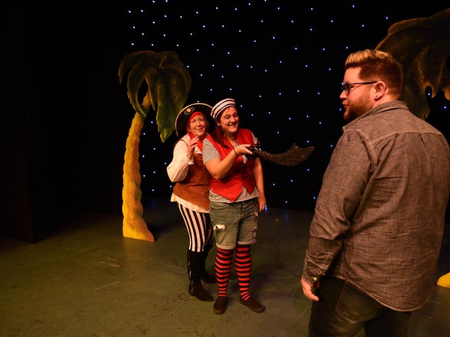 Sally Fewster, Kirsty Dixon and Chris Wales have fun in rehearsals.