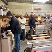 Staithes Men's Shed members working away and enjoying the conversation.