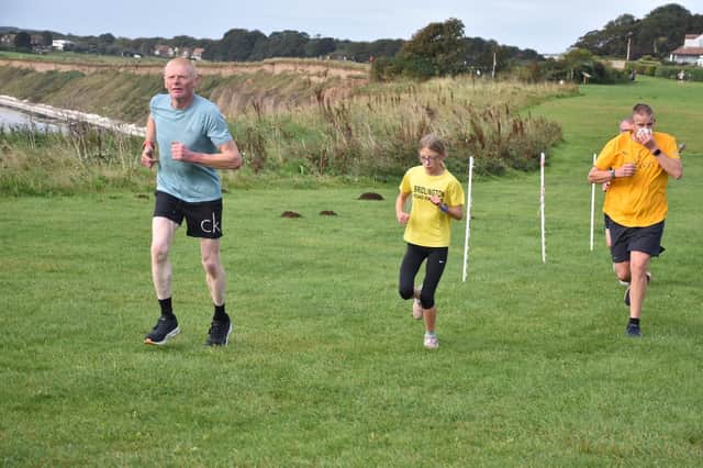 A young Bridlington Road Runner works her away along the clifftops during the Sewerby parkrun on Saturday morning. PHOTOS BY ALEXANDER FYNN