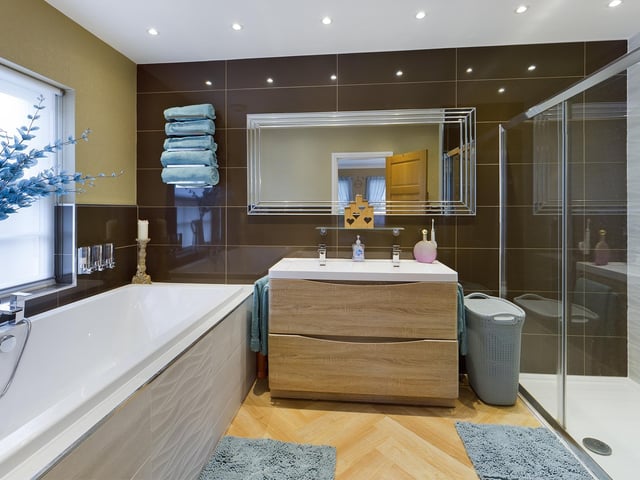 One of the bath and shower room facilities in the Stepney Grove property.
