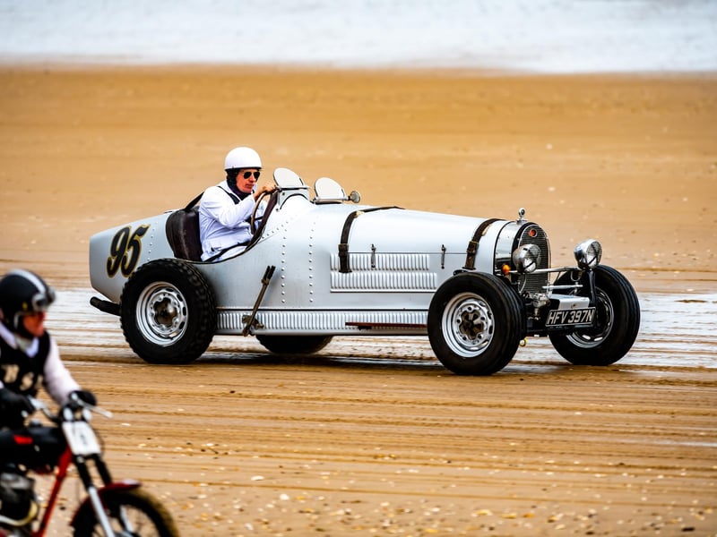 This years The Race the Waves Vintage Beach Race festival held on Bridlingon's south beach with over one hundred competitors taking part in the event from the early years of coastal motor racing to post-war American hot-rodders and drag racing culture. Picture By Yorkshire Post Photographer, James Hardisty. Date: 22nd April 2023.