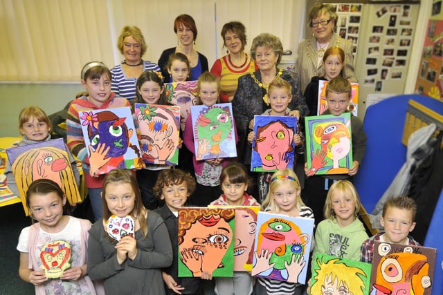 Youngsters at Seamer and Irton Primary School are presented with their Artbeat awards.
