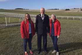 Mayor of Malton Cllr Ian Conlan with Racing Welfare’s welfare officers Harriet McHugh and Sarah Monkman.