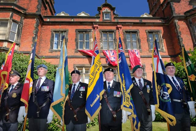 Standard bearers at the flag raising for Armed Forces Day in Scarborough