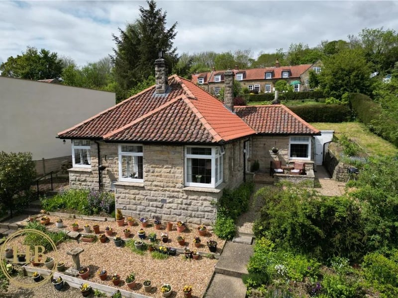 Two-bedroom detached bungalow, with Hope & Braim, £400,000.