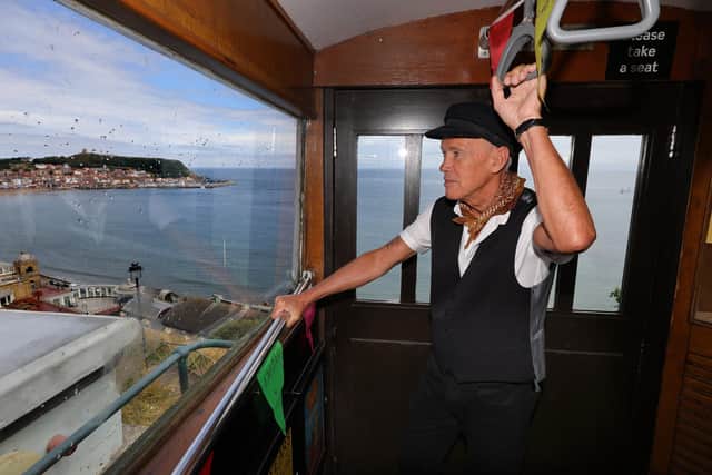 Operator Darryl Taylor in the carriage which affords a spectacular view across Scarborough