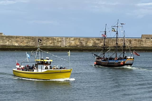 Pleasure boats take passengers out on the sea around the harbour, by Graham Templeton.