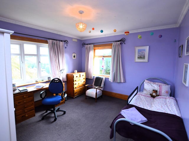 Seven bedrooms are spacious and versatile.