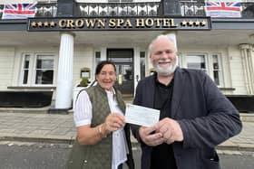Shirley Smith, President of the Scarborough Hospitality Association, donating a cheque to Kane Cunningham, co-director of the Big Ideas By The Sea Festival,