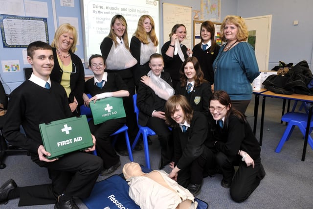 Scalby School pupils taking part in the launch of the Young First Aiders course. From left, back, Billie Dunster, Hannah Gillard, Katie Millward, Emily Schneider, teacher Lynn Walsh, front, David Sessions, teacher Kath Baggallay, Sammi Lee, Terri Marshall, Jamie Ellis, Matthew Wright, and Toni-Roxanne Rennison.     100448a