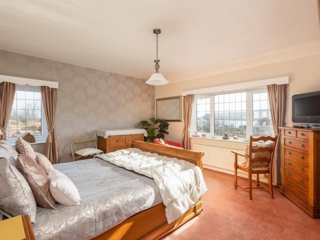 A double bedroom with extensive views right out to sea.