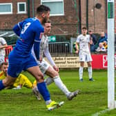 Stephen Walker (No 9) opens the scoring for Whitby Town as they defeated a young Macclesfield side 2-0 on the final day of the season. PHOTOS BY BRIAN MURFIELD