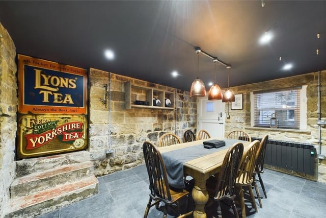 The rustic style dining room has plenty of space for entertaining.