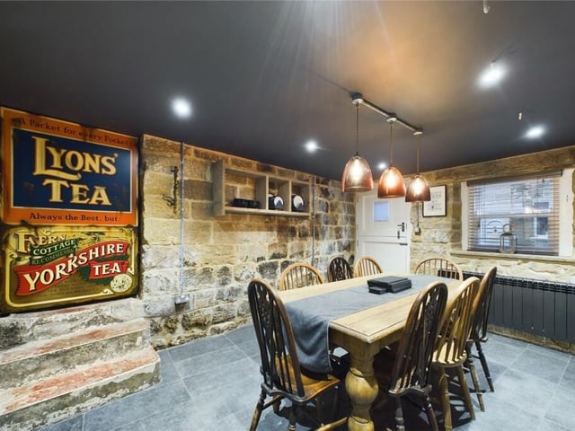 The rustic style dining room has plenty of space for entertaining.