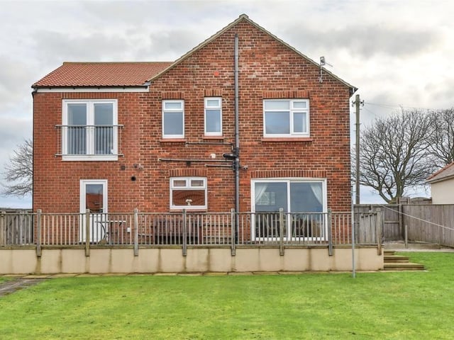The house has a good sized patio terrace to the rear, overlooking the lawned garden.