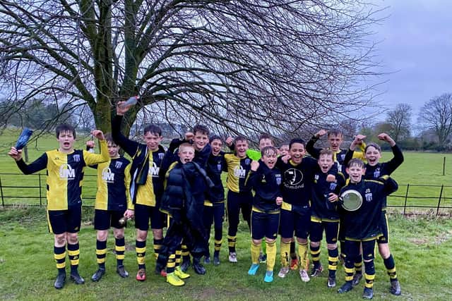 Scalby Under-13s celebrate winning the Minor League title