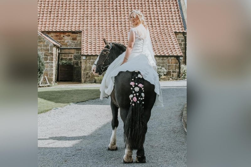 The bride arrives by horse!
picture: Angela Waites