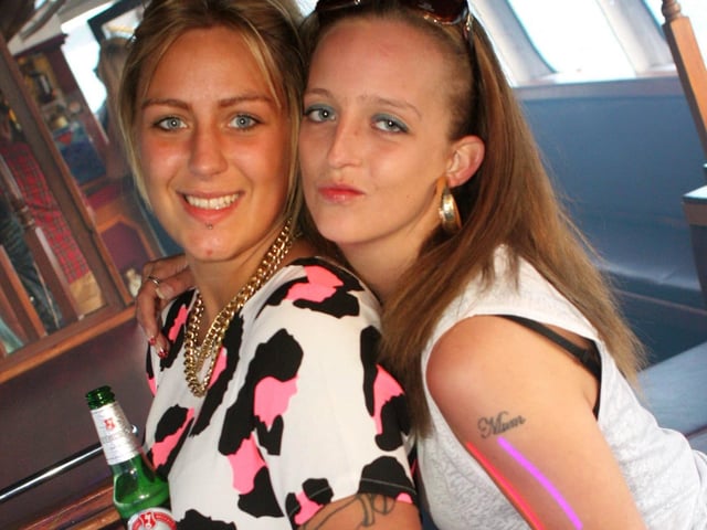 Jayme and Leanne celebrating Jayme's birthday at Catch The Wave's boat party.