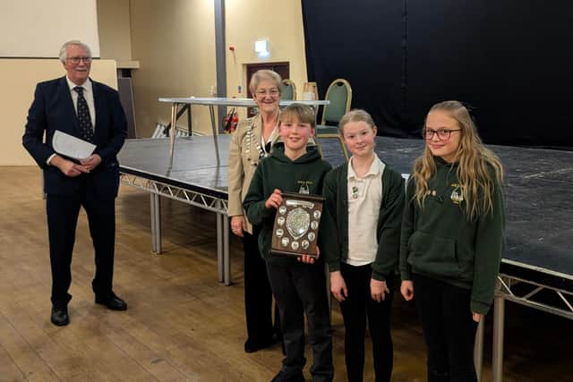 Mike Stones and Whitby Mayor Sandra Turner with the winning Airy Hill School team.