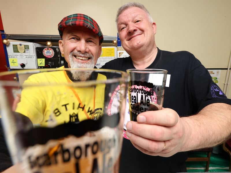 Graham Woodford and Eddie Knorn show off the festival glasses